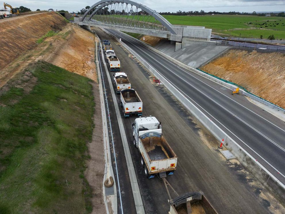 Trucks lining up towards the 95-metre long Kilmany bridge