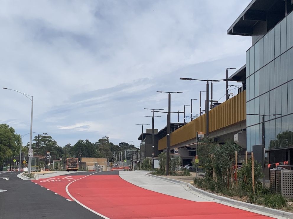 Bus interchange with red lanes next to Croydon Station.