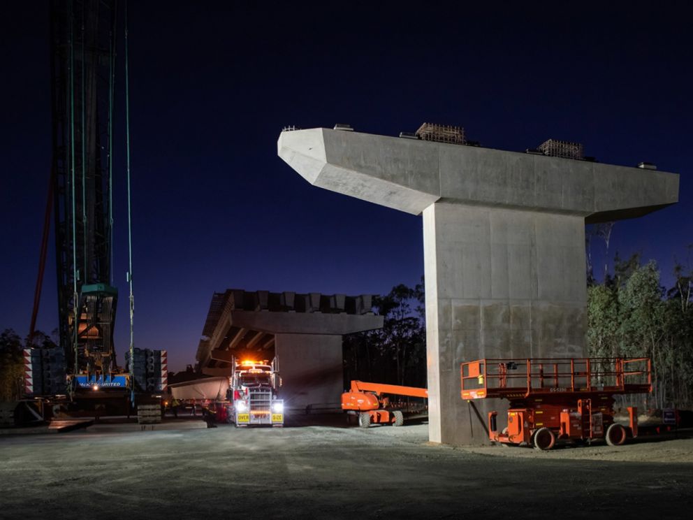 Bridge beams being delivered on NSW side