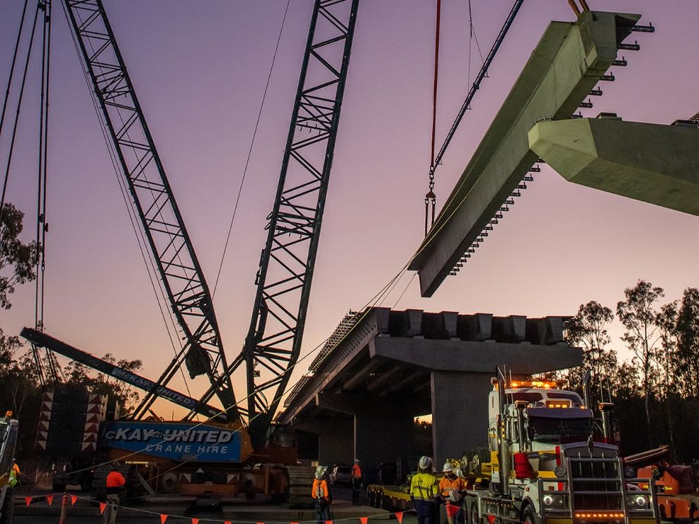 Bridge beams being installed on NSW side