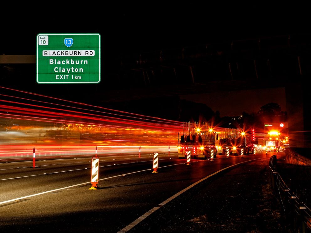 February 2020 Works began with our first overnight lane closures. The image show the Blackburn Rd exit sign above with safety precautions leading towards the construction