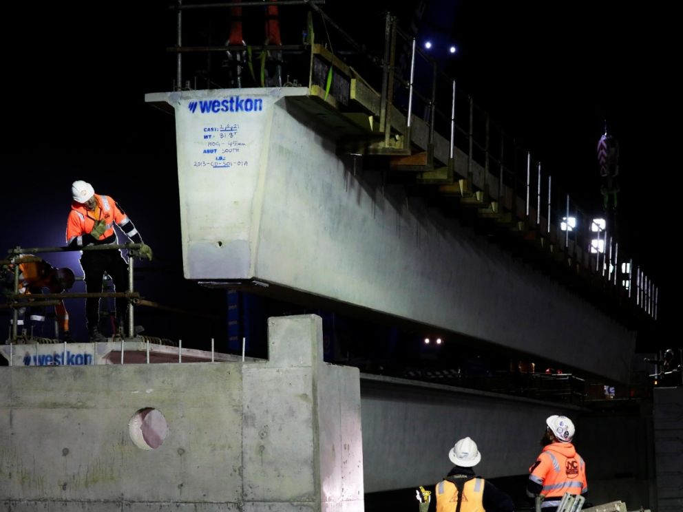 Lifting the beams into place for the bridge over Centre Dandenong Road.