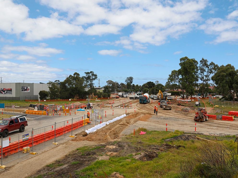 Works to build the new intersection at Wells Road and Thames Promenade with construction vehicles, safety measures etc.