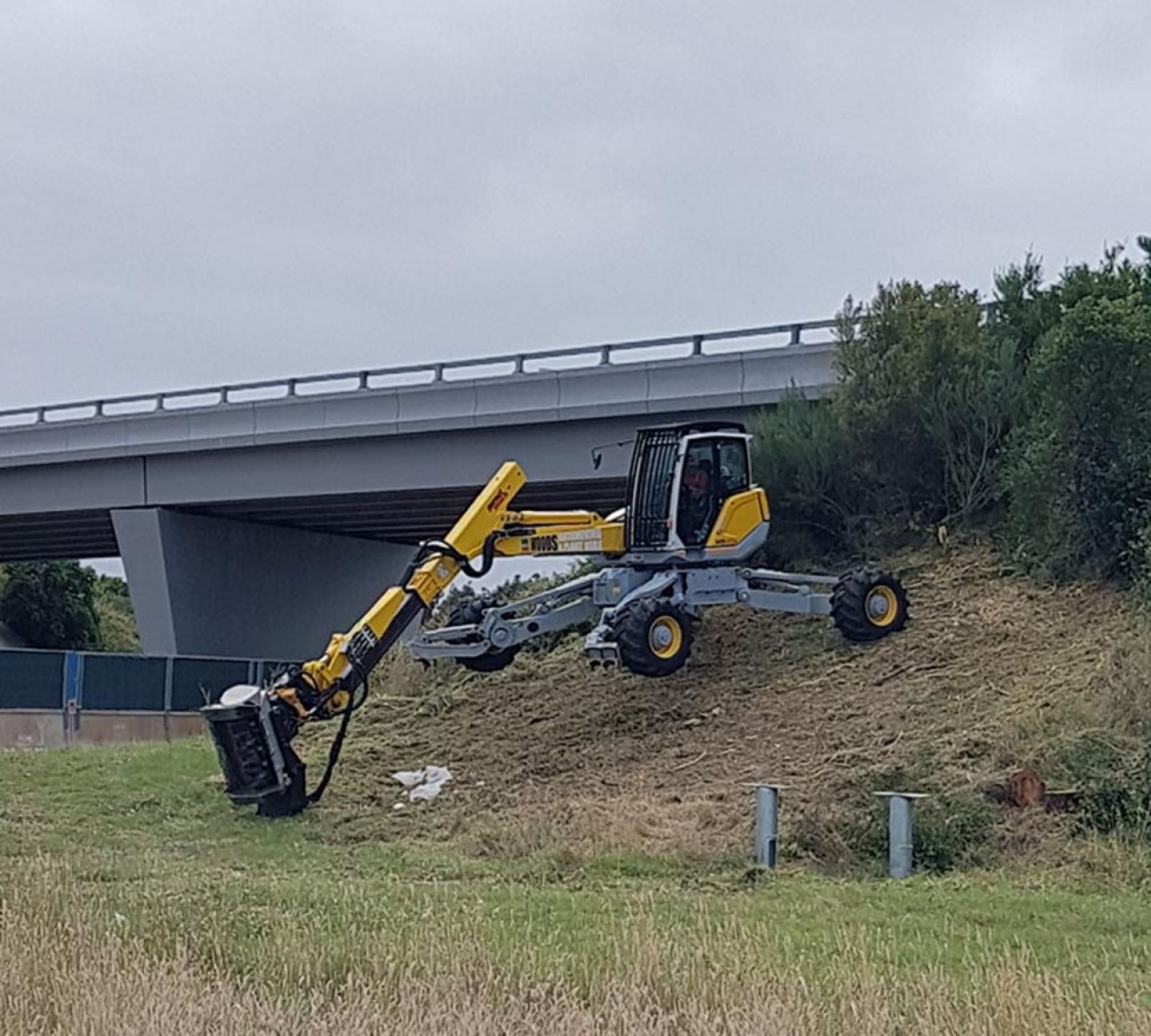 Monash Freeway spider excavator on a hill