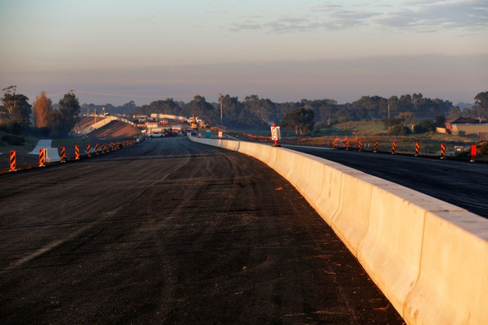Installing the safety barriers between Old Dandenong Road and the Dingley Bypass