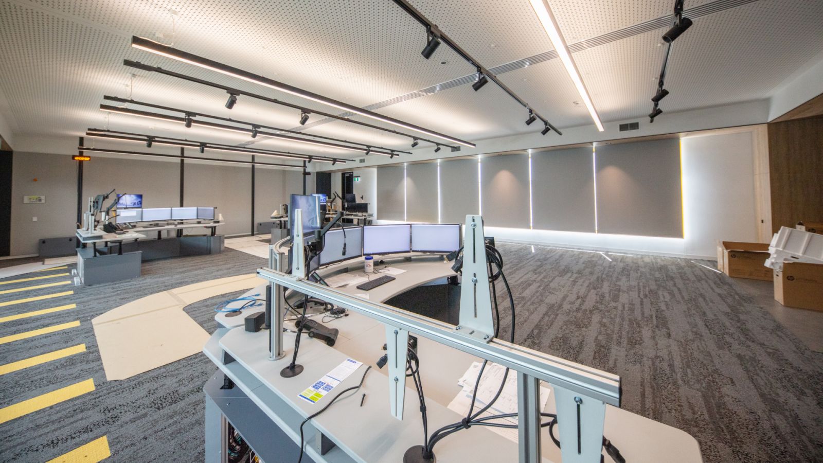 The inside of the new High Capacity Signalling Centre, with desks and chairs in an office