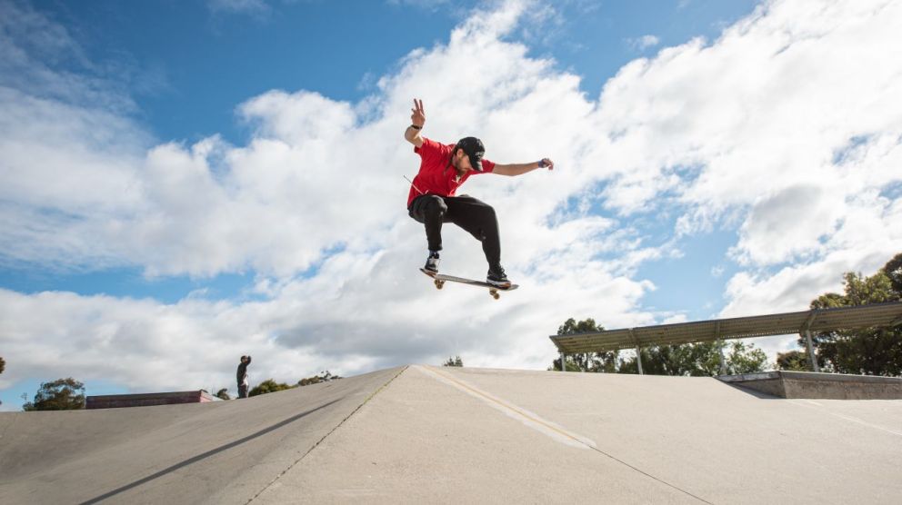 A YMCA All Broad instructor showcasing his skate boarding skills