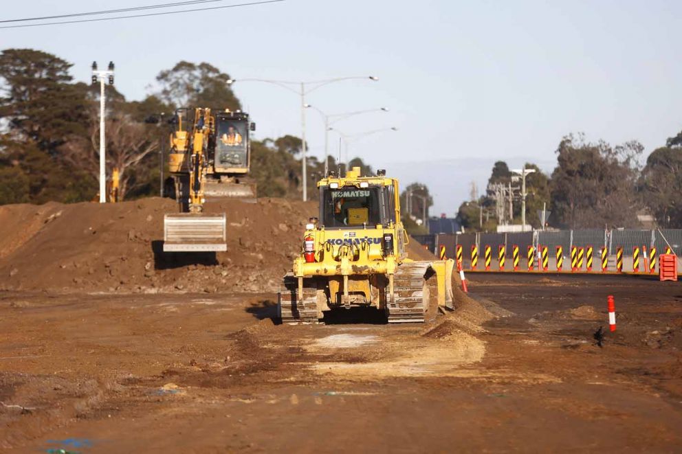 Stockpiling material to build the expanded intersections