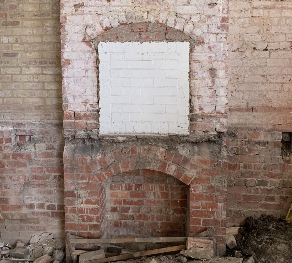 The unexpected fireplace, fully-uncovered, in the Telegraph and Parcels Office