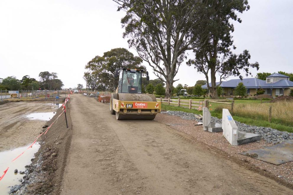 13 tonne roller compacting material for the foundation of the new lanes