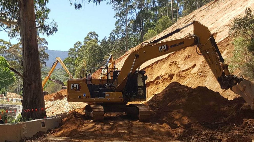 Machinery clearing debris 9 February