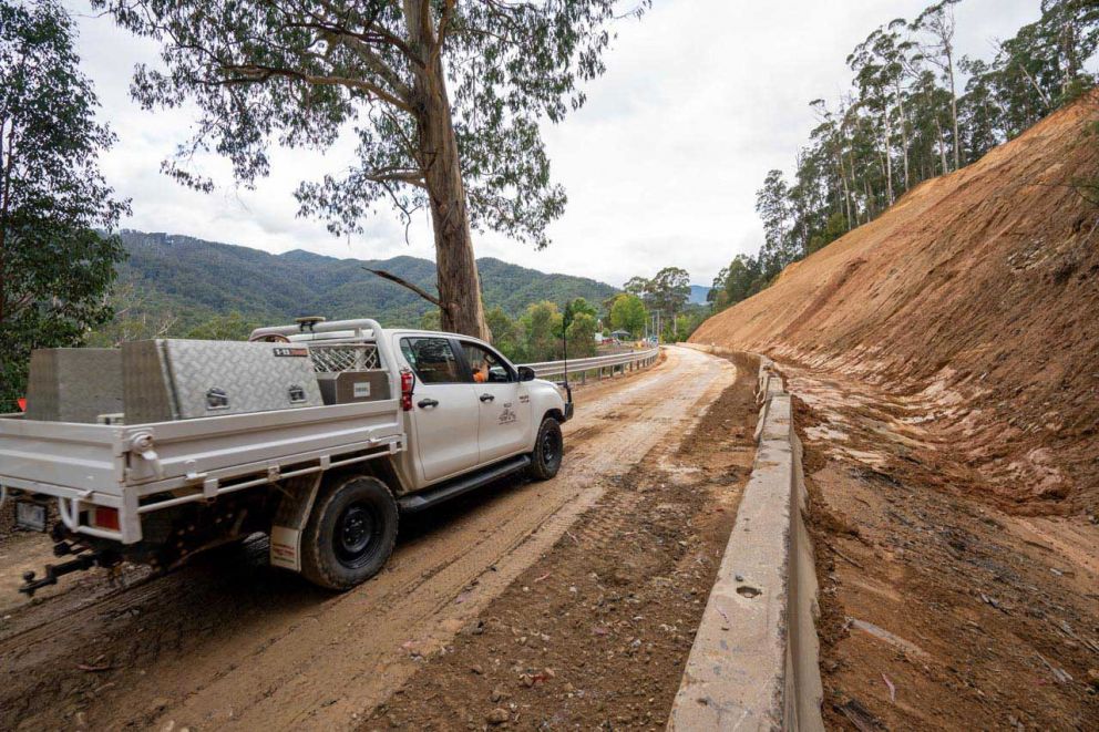 Construction vehicle enters Bogong High Plains Road toward the landslip 31 March