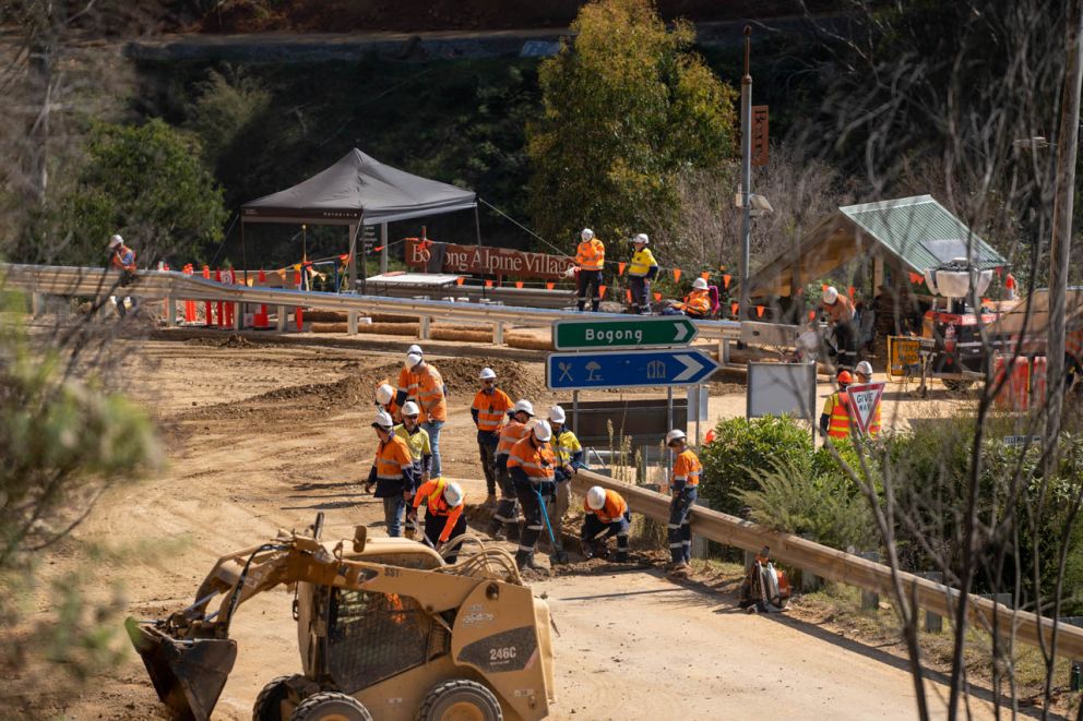 Crews prepare the ground for asphalt works on 5 April