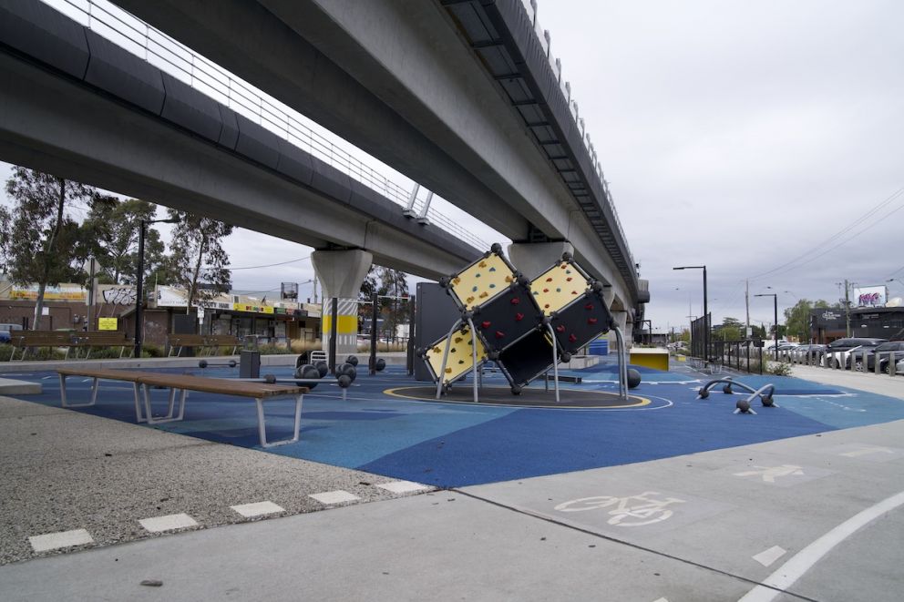 Play and exercise equipment under the rail viaduct in Clayton.