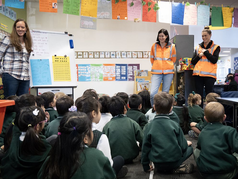 Image shows SRLA staff teach school children about big construction projects