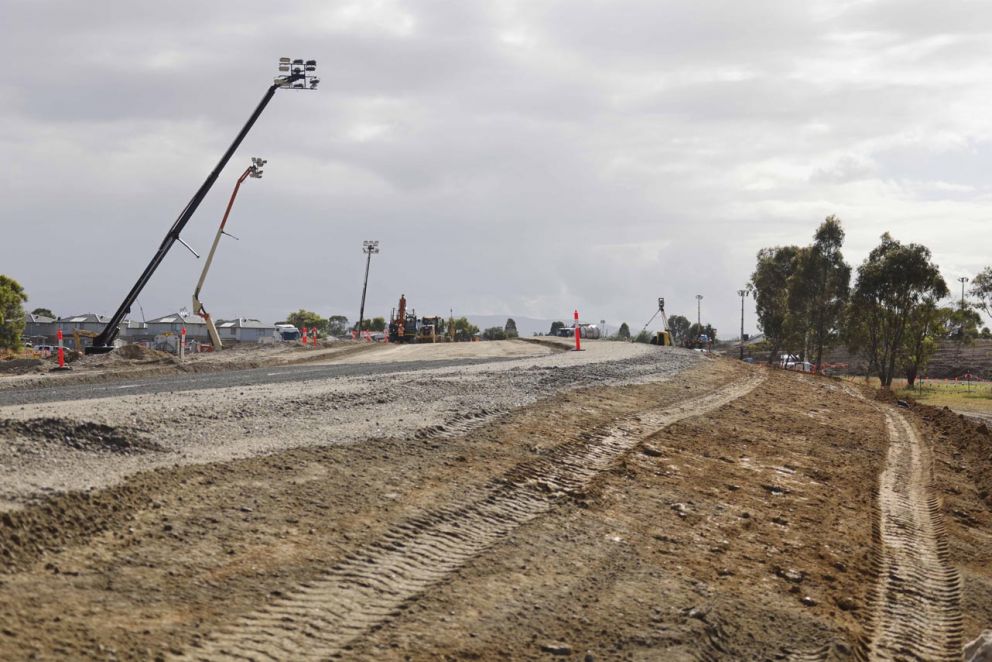 The floor of the new lane on the widened freeway ramp is now level with the existing road.