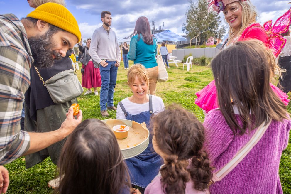 People eating at the South Yarra Community Day