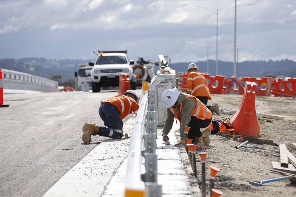 August 2024- Guardrail installation to prepare the new bridge for opening