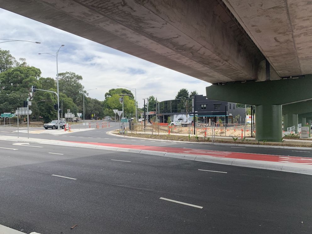 Road under the elevated rail bridge