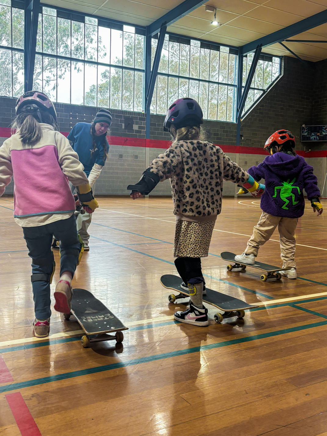 Group of children on skateboards