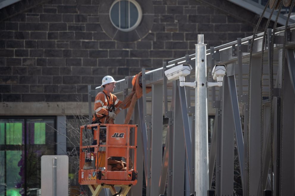 Lifting the steel overpass frame into the project work site for fit-out works