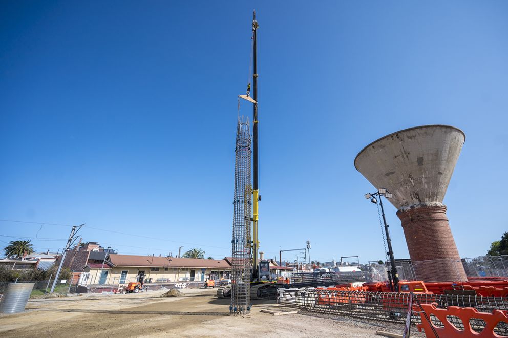 Steel reinforcement cage lifted into position