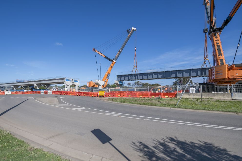 The giant steel bridge structures will form the new rail bridge over Coburns Road