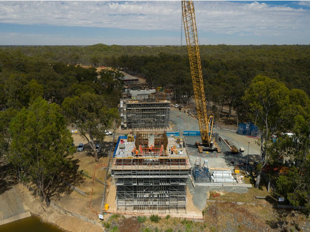 Birds eye view of the pier construction positioned in the middle with nature surrounding