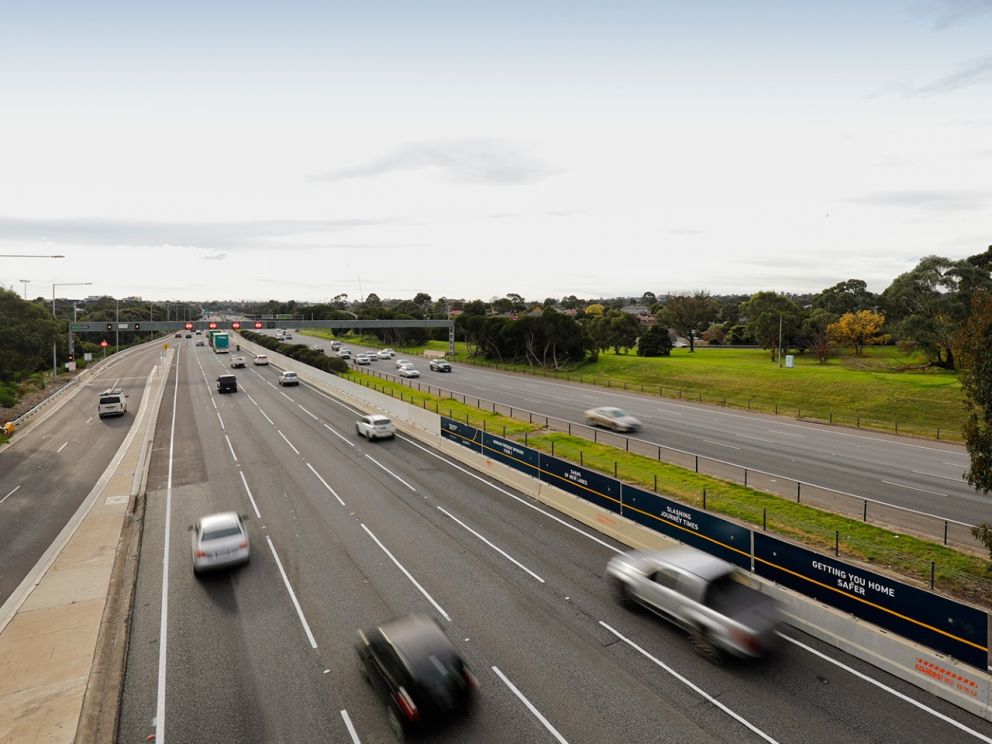 April 2020 First of 48km of concrete barriers installed along the freeway centre median.The image also has traffic present on the roads with the concrete barriers along the middle.