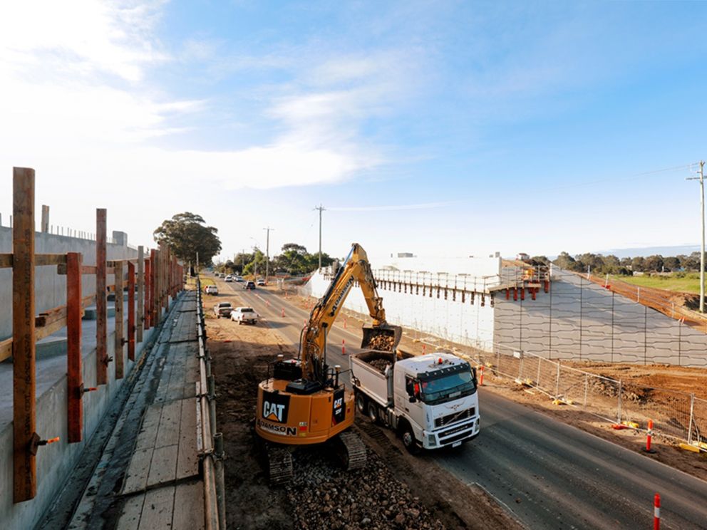 Preparing Old Dandenong Road before installing the first bridge beams for the Freeway