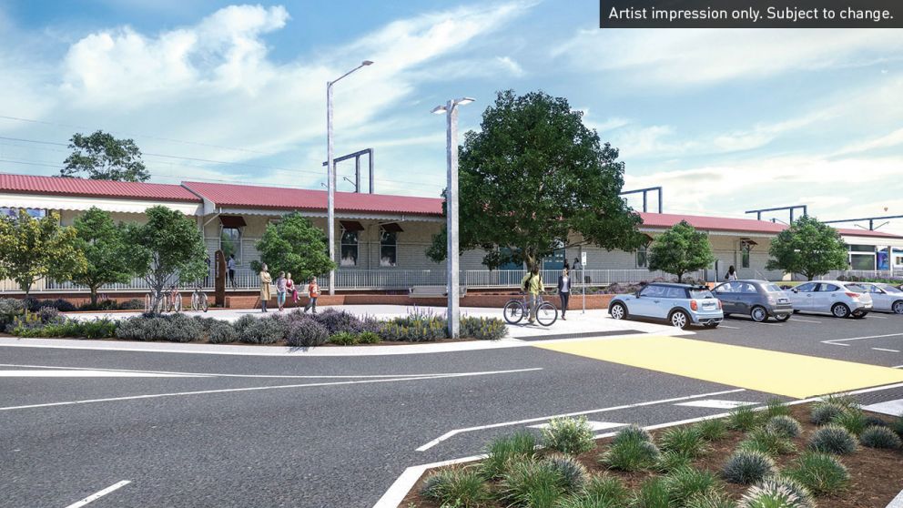 Artist impression of the existing Lilydale Station Building in the new precinct with nearby parking. Artist impression only. Subject to change.