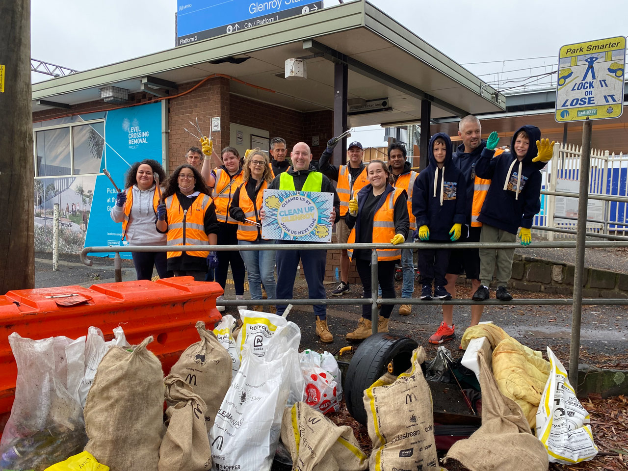 Glenroy Road team at the station with bags of rubbish