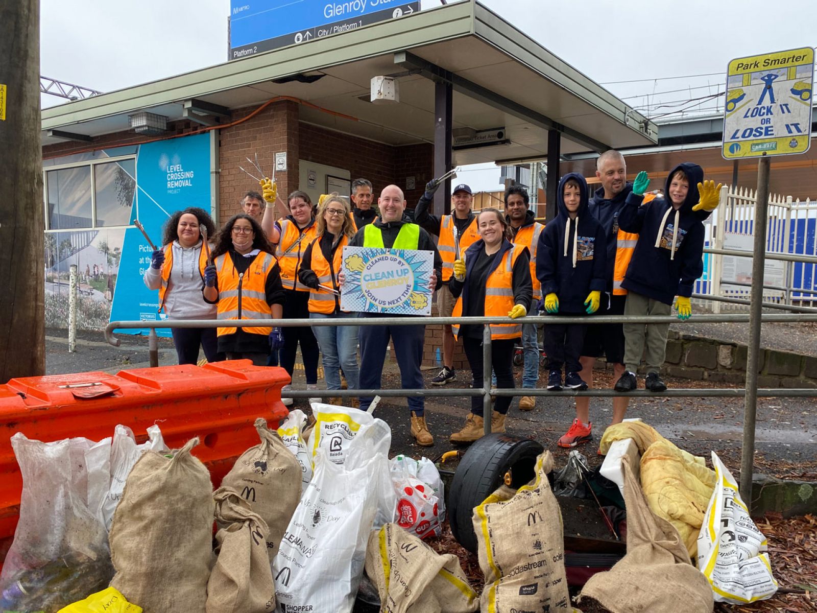 Glenroy Road team at the station with bags of rubbish