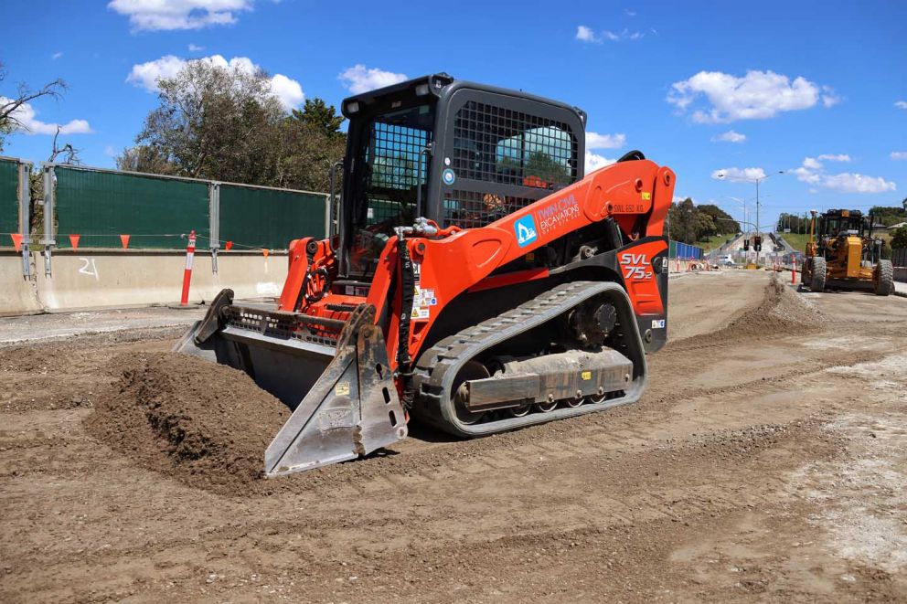 Excavator in use conducting earthworks on the Narre Warren North Rd Upgrade