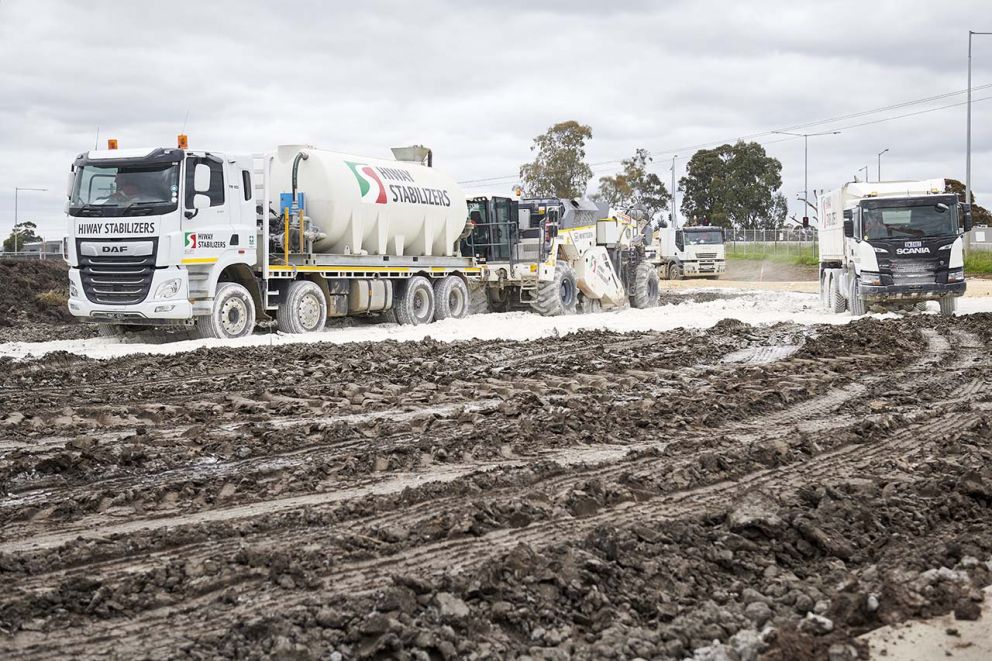 Laying down lime cement to improve soil conditions and increase rigidity