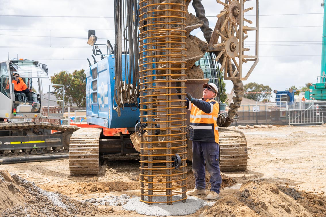 Pile cage being lowered.