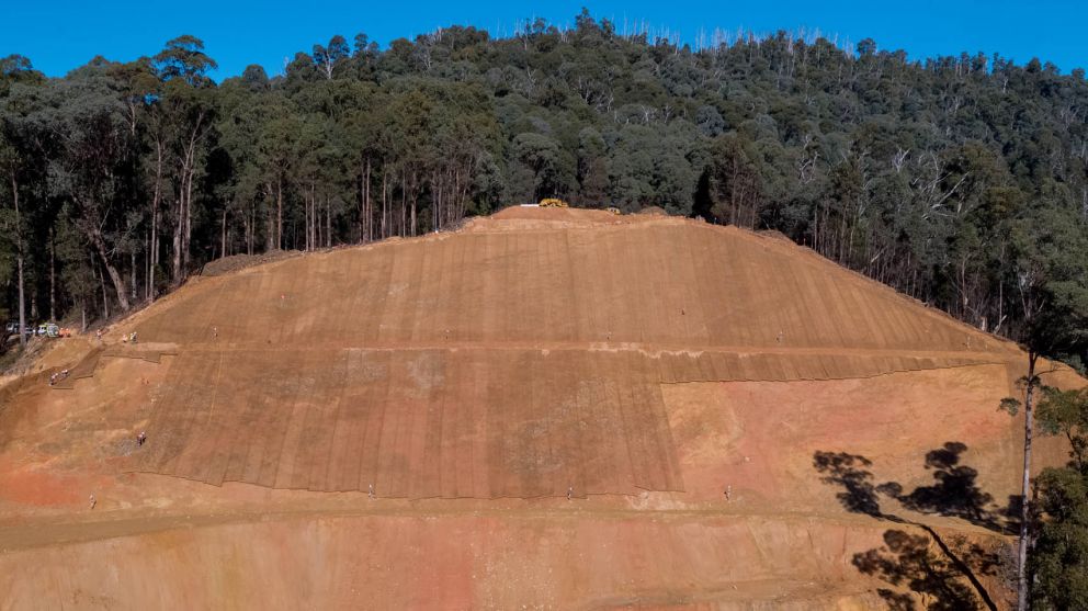 Anti-erosion mesh covering the majority of the Bogong High Plains Rd landslip.