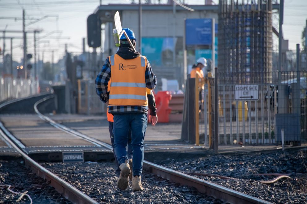 Workers on the tracks at Keon Parade