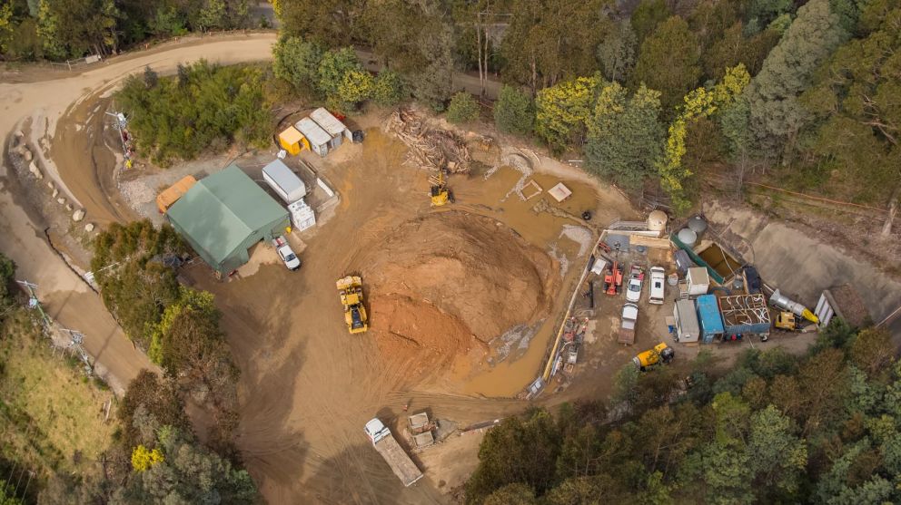 Machinery clearing a stockpile at AGL shed