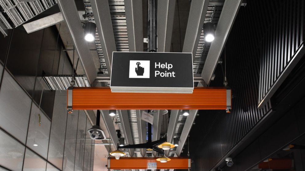 a 'Help Point' signage on platform levels