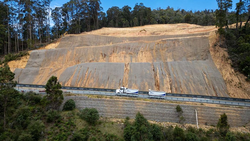 A truck returns to collect another load of material for disposal