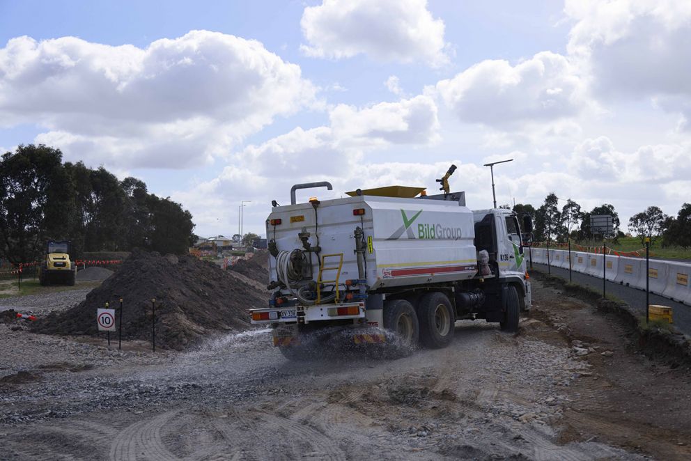 December 2023- A water cart spraying down the worksite to reduce dust on the McGregor Road outbound exit ramp