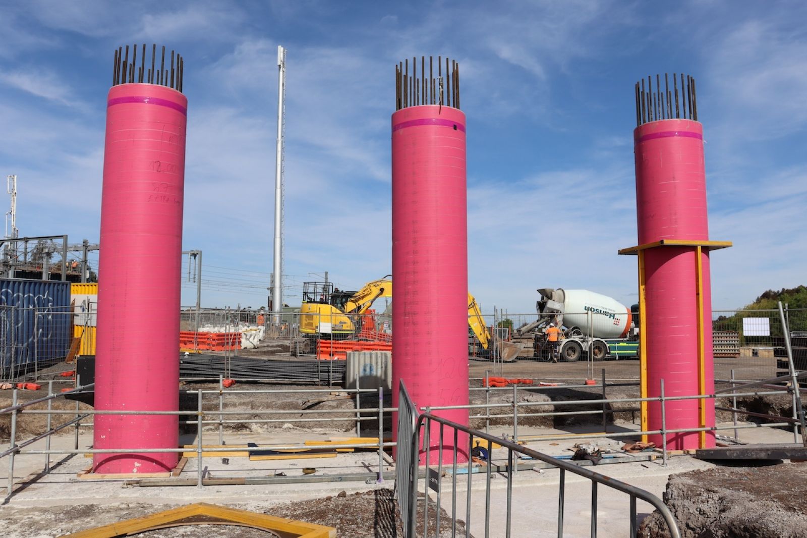 Three pink pillars out of ground