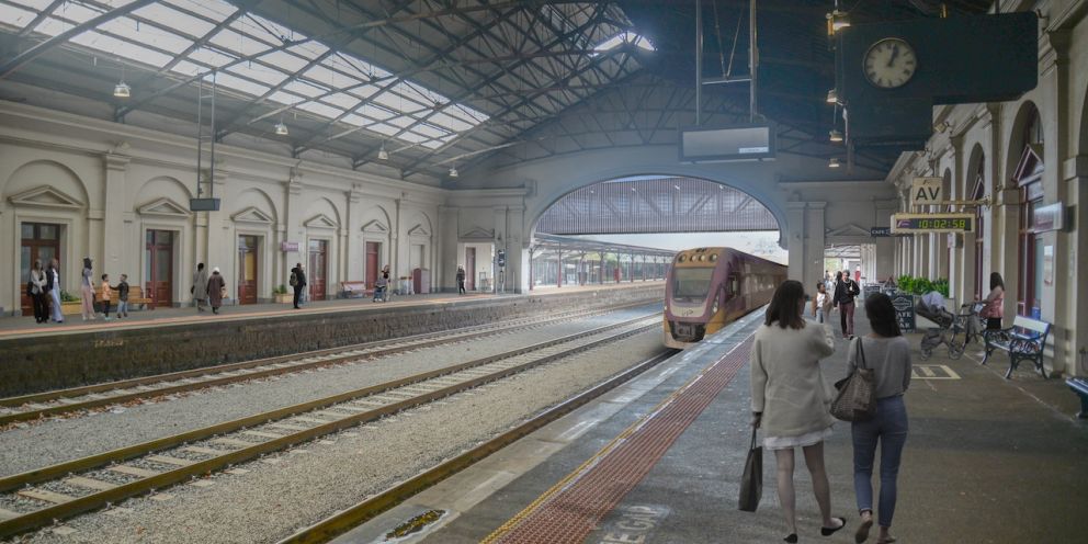 View of the overpass framed by the train hall arch, looking to the east. Artist impression, subject to minor change. Design endorsed by Heritage Victoria