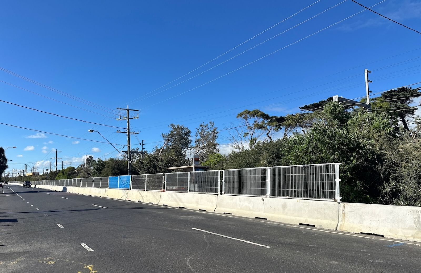 Image of new fencing set up along the perimeter of the works area