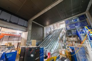 Escalators to the concourse inside the main entrance