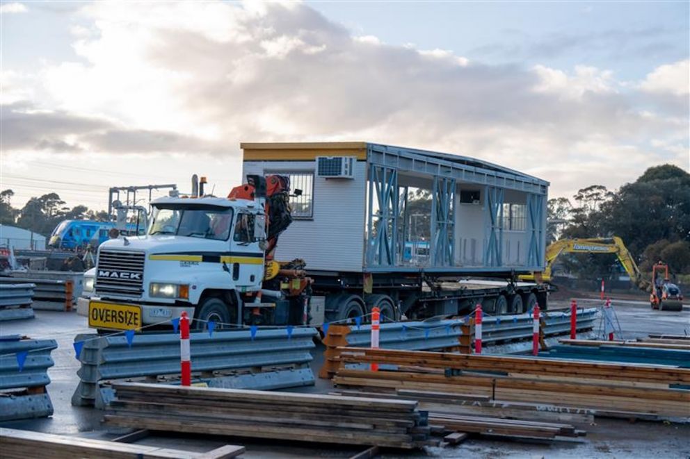 A prefabricated site office is dropped off at Webster Street, Dandenong