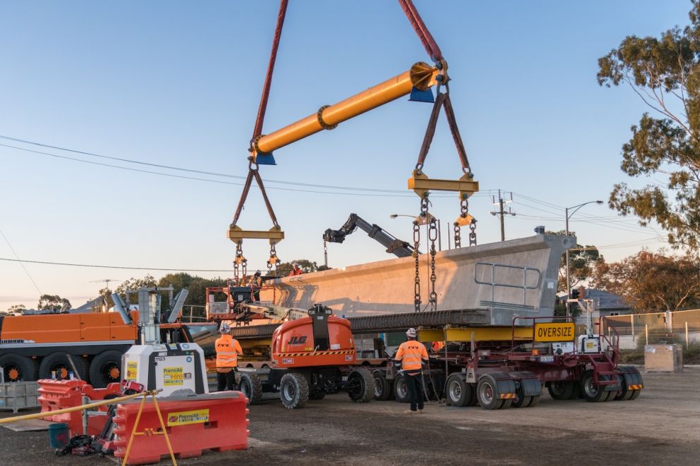 The L-beams are transported to site during the night to minimise disruption