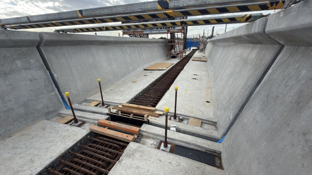 Formwork in place prior to concrete being poured into the gap between L-beams