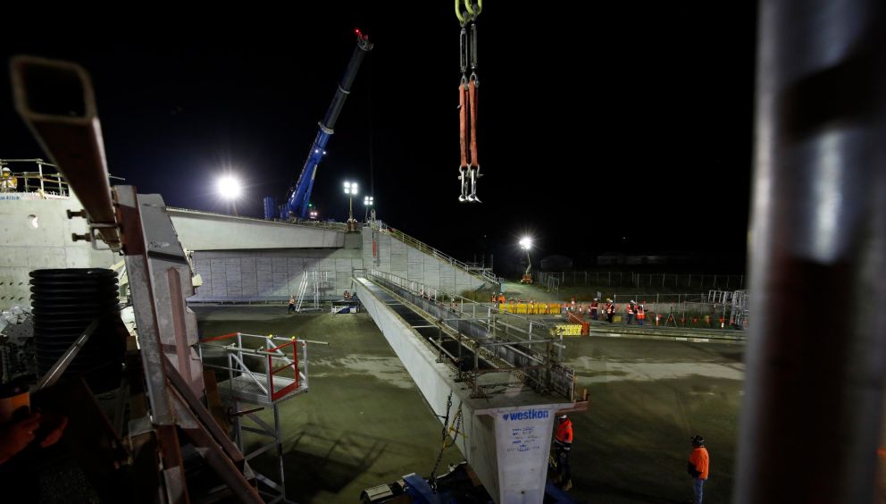 Lifting the beams into place for the bridge over Centre Dandenong Road.